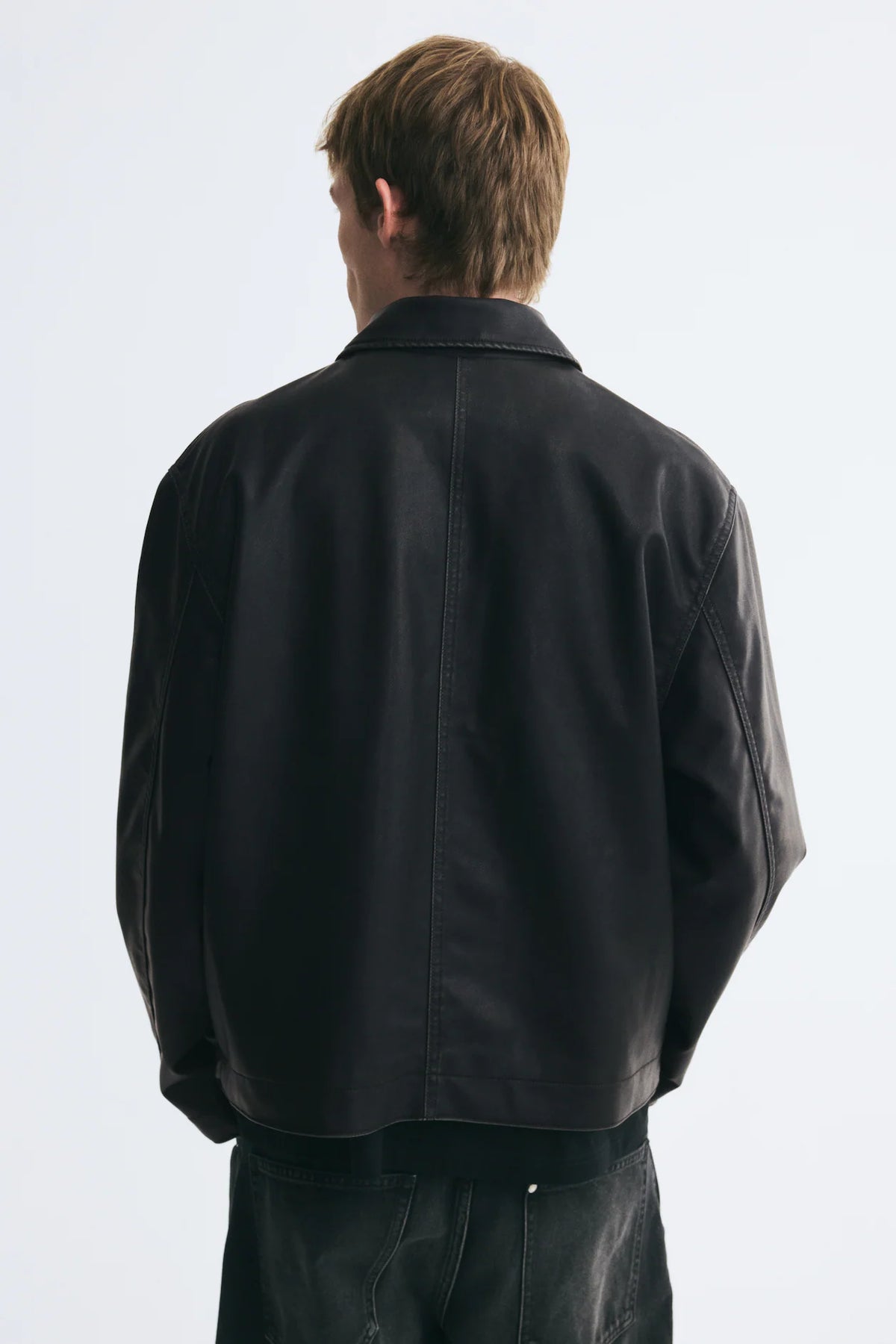 Black leather zip jacket - zip detail close-up