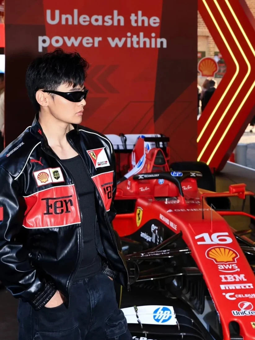 Scuderia Ferrari F1 jacket close-up of sponsor patches and Ferrari stripe
